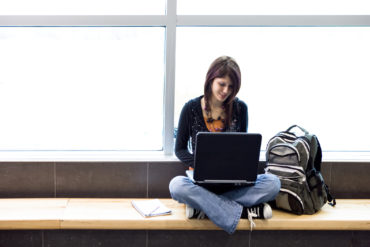 College Student on Computer Photo