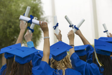 Graduation Photo with Students holding Diplomas