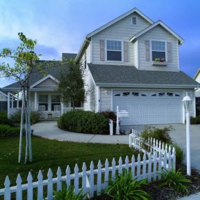 Mortgage Home With White Fence